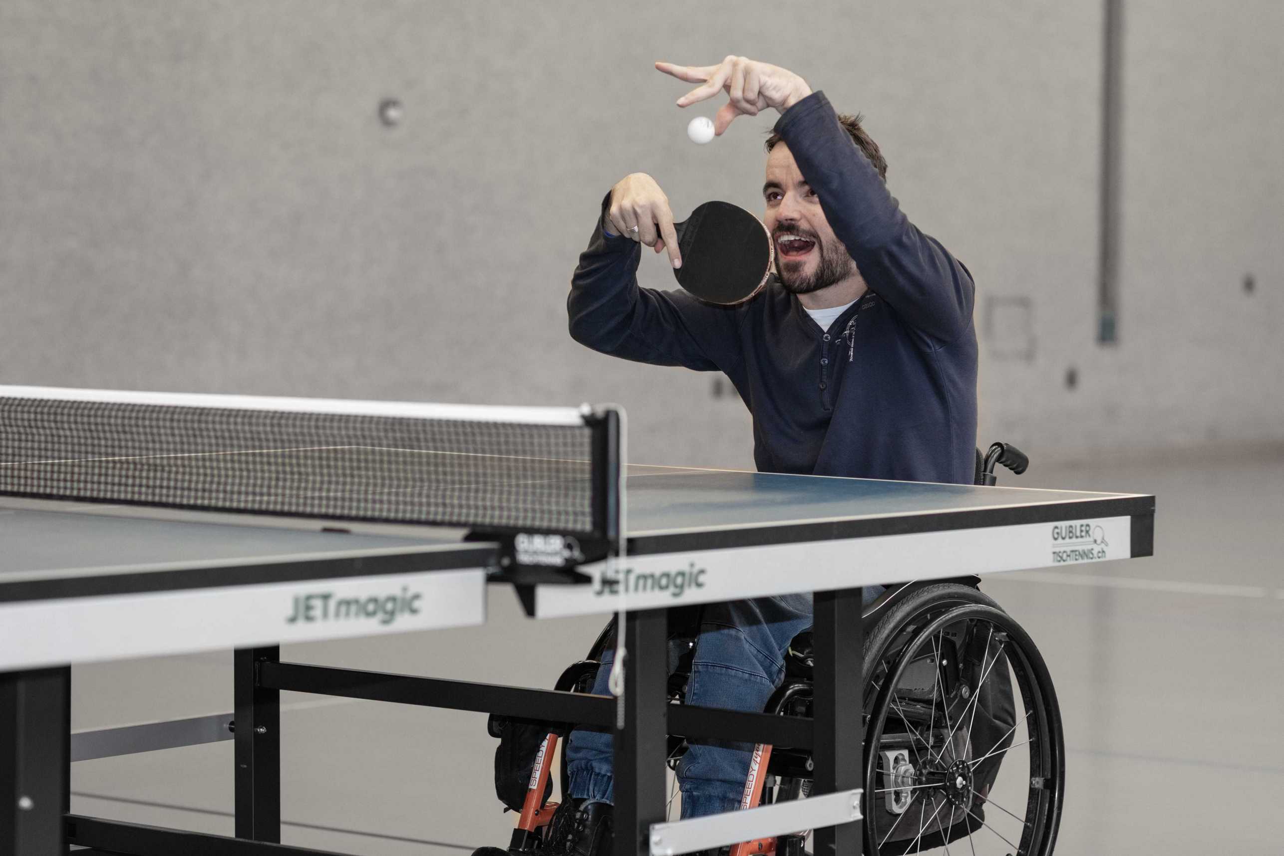 Enlarged view: Philippe Amann plays table tennis sitting in a wheelchair