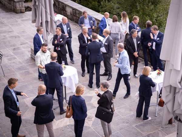 A group of people gathered on the sun terrace of Villa Hatt